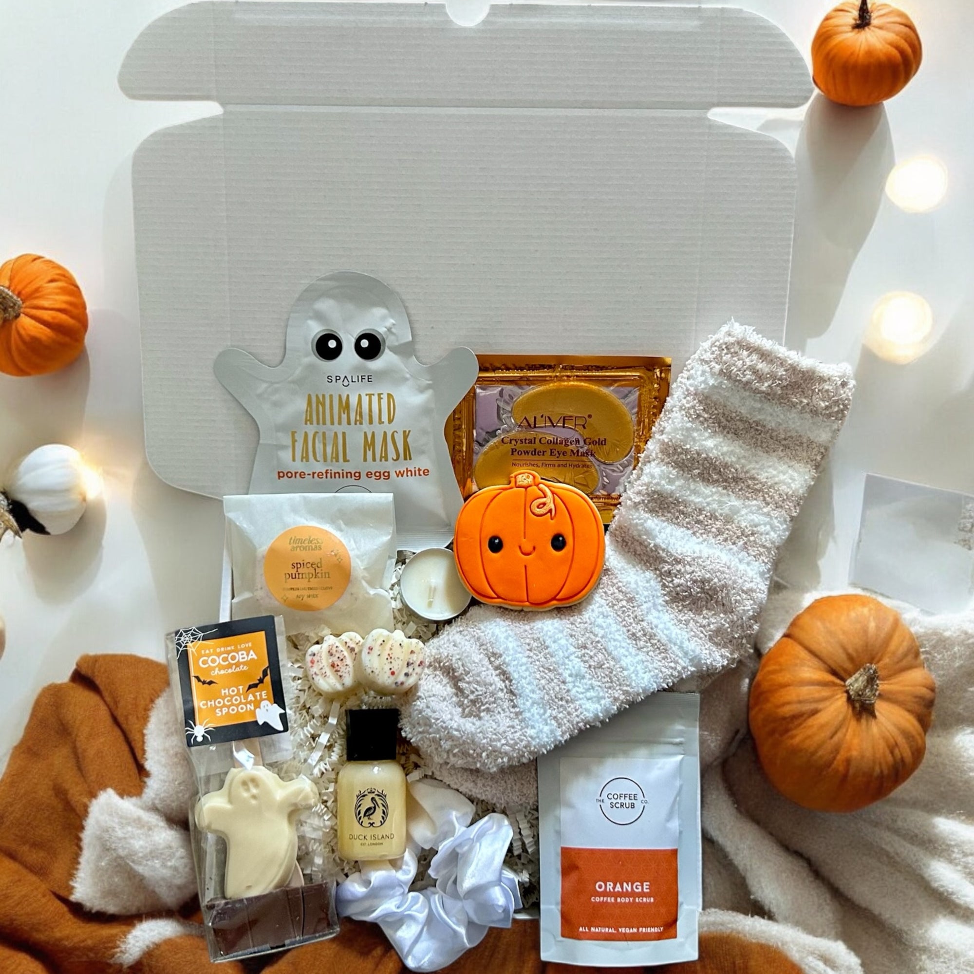 Halloween-themed boo gift box for her, filled with cozy fall treats, self-care items, and spooky cute surprises, perfect for girlfriend or bestie