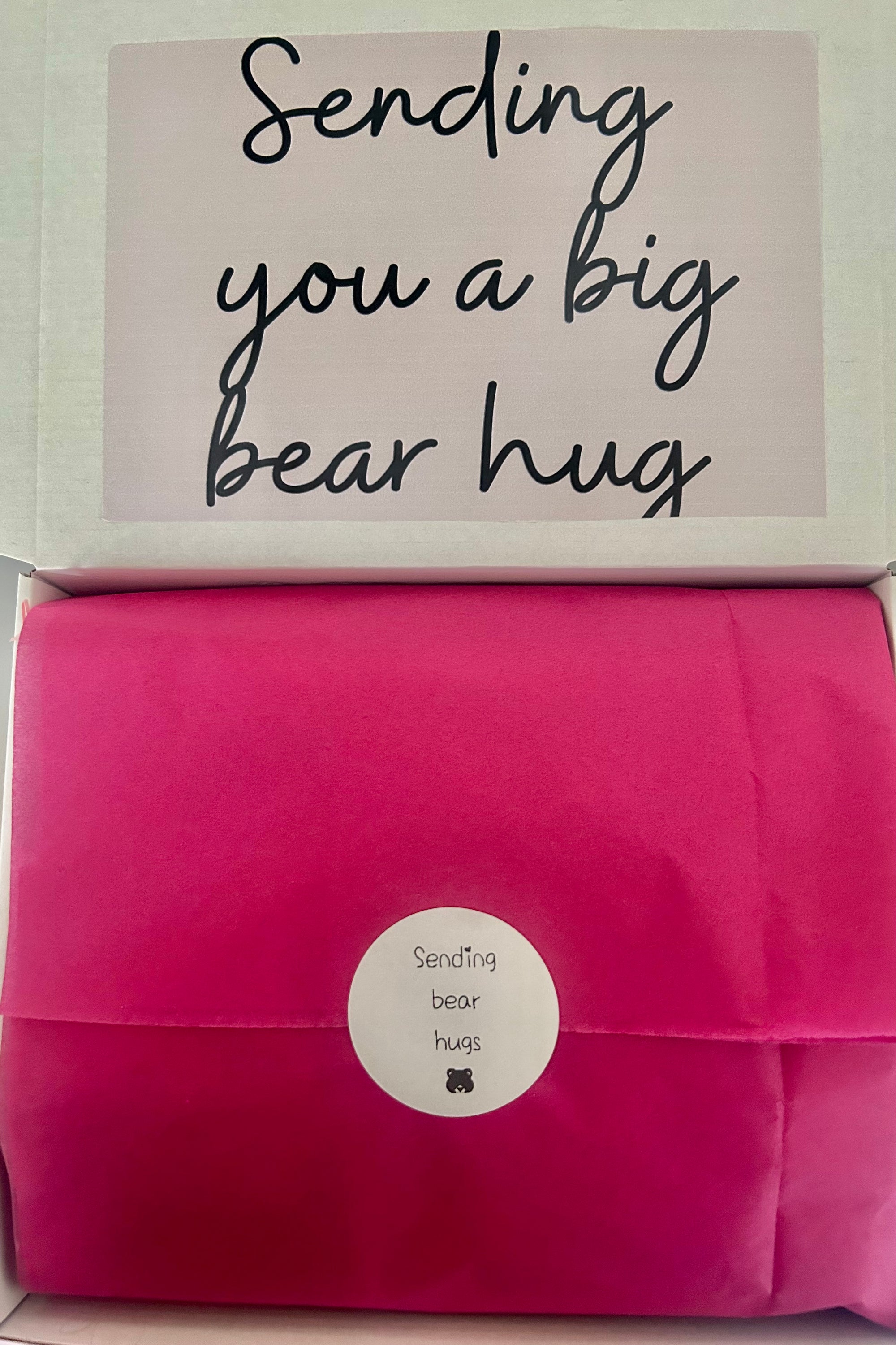 Sending Bear Retirement Gift Box featuring a soft teddy socks, sweet treats, a relaxing foot mask, and a retirement card, beautifully arranged to celebrate this special milestone.