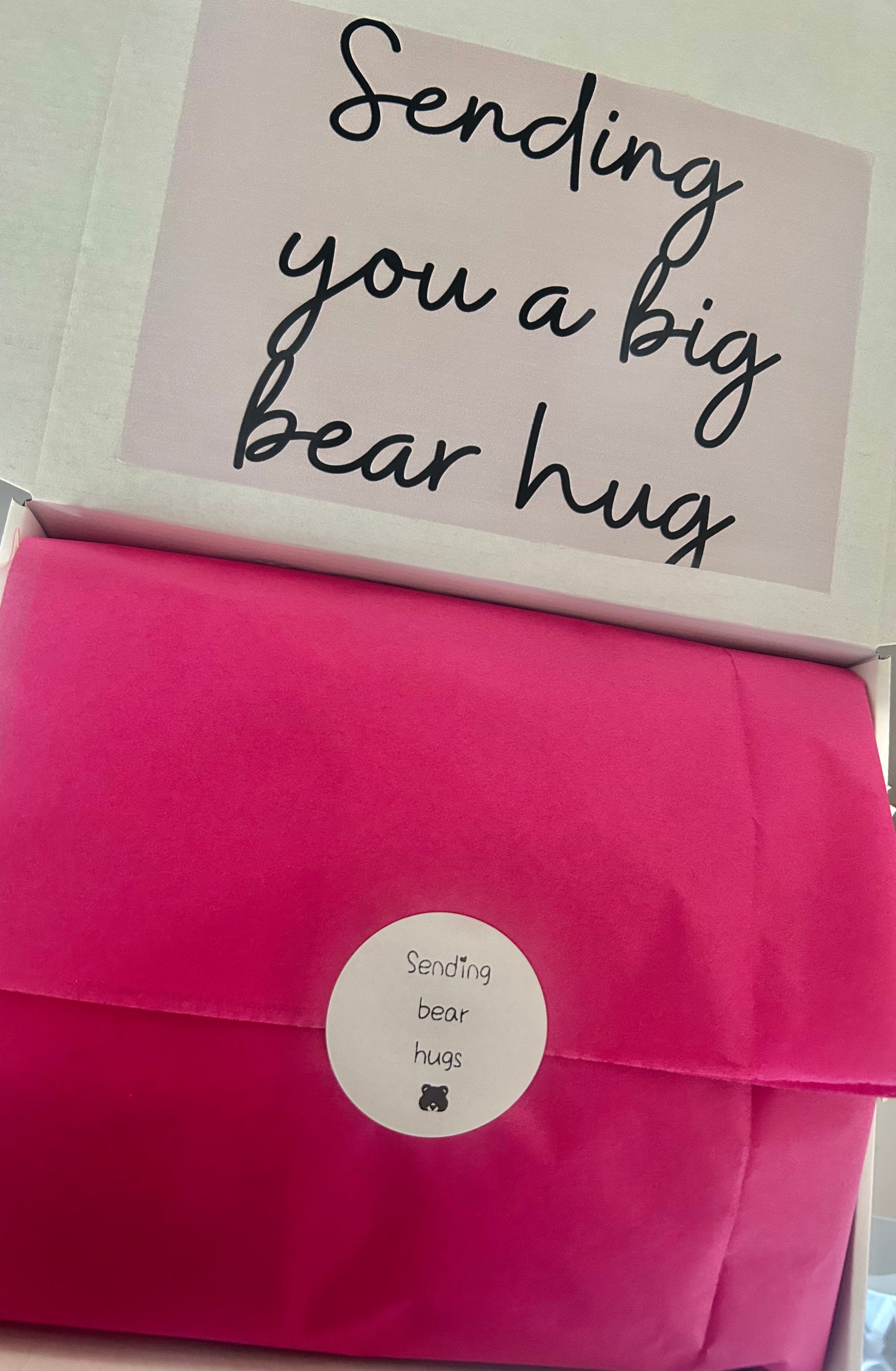 Sending Bear Retirement Gift Box featuring a soft teddy socks, sweet treats, a relaxing foot mask, and a retirement card, beautifully arranged to celebrate this special milestone.